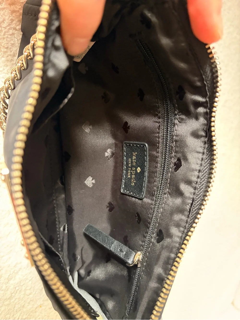 kate spade black nylon wristlet with gold chain strap